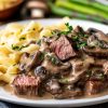 Tagliatelle con punte di filetto, funghi porcini e scagle di parmigiano